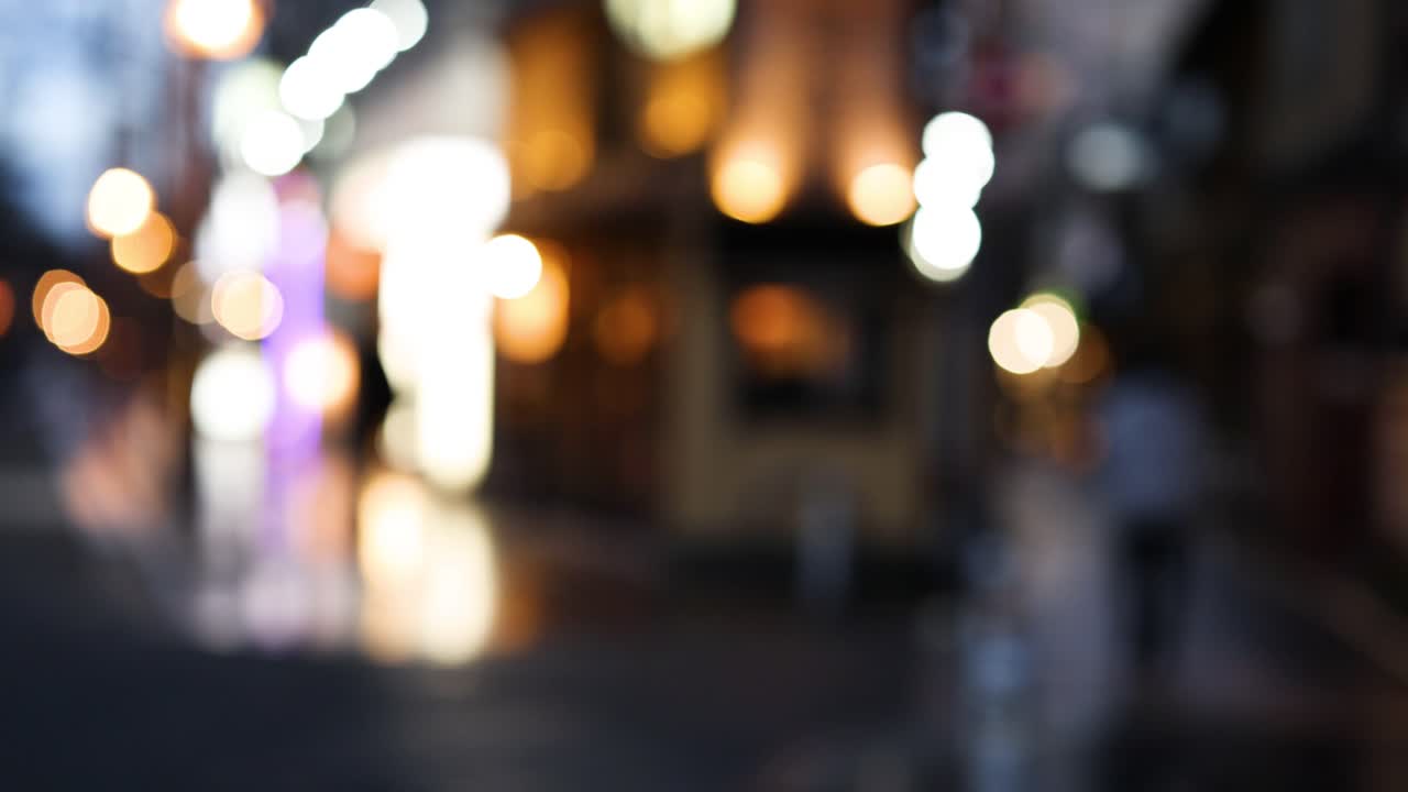 Out-of-focus city lights shimmering at night