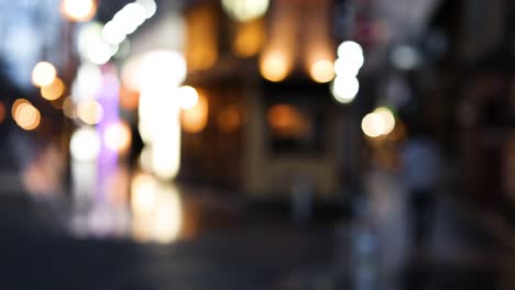 out-of-focus city lights shimmering at night