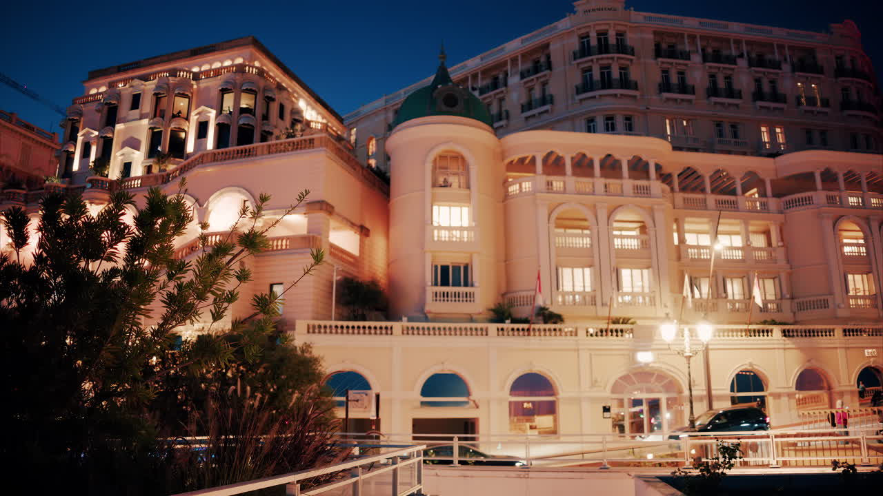 Monte Carlo, Monaco - October 14, 2024: The facade of Hotel de Paris in the evening