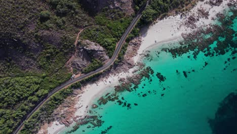 aerial flying down towards the road and coastline in eagle bay, dunsborough, western australia