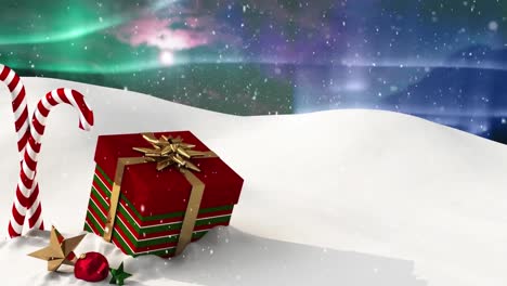 Digitale-Animation-Von-Schnee,-Der-über-Weihnachtsgeschenkbox,-Zuckerstange-Und-Weihnachtsdekorationen-Auf-Wi-Fällt