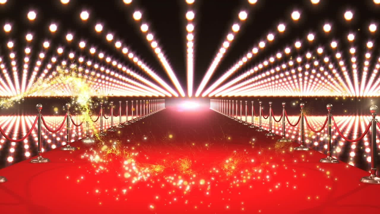 Animasi kembang api kuning di atas lokasi karpet merah dengan kilatan lampu blitz paparazzi.
