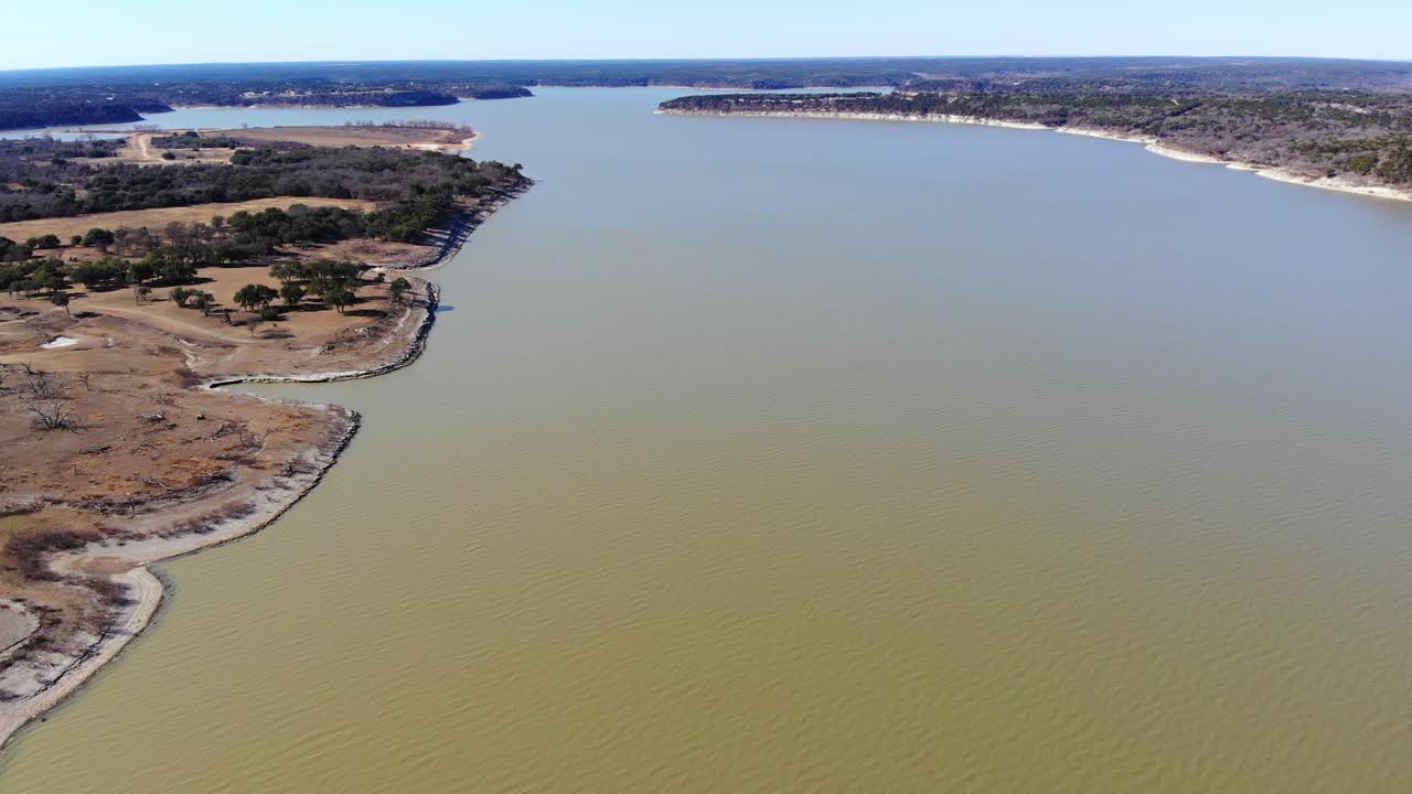 Starting high above the lake, with one third of the shoreline on the left and all water on the right