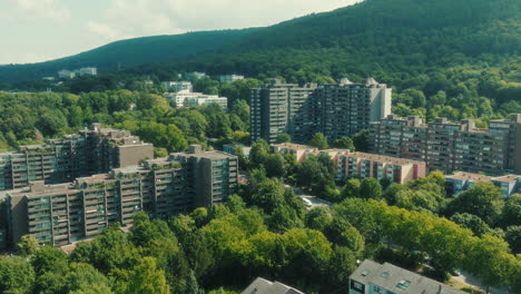 dolly out drone shot of emmertsgrund neighborhood and cityscape during the day in heidelberg, state of baden-wurttemberg, germany