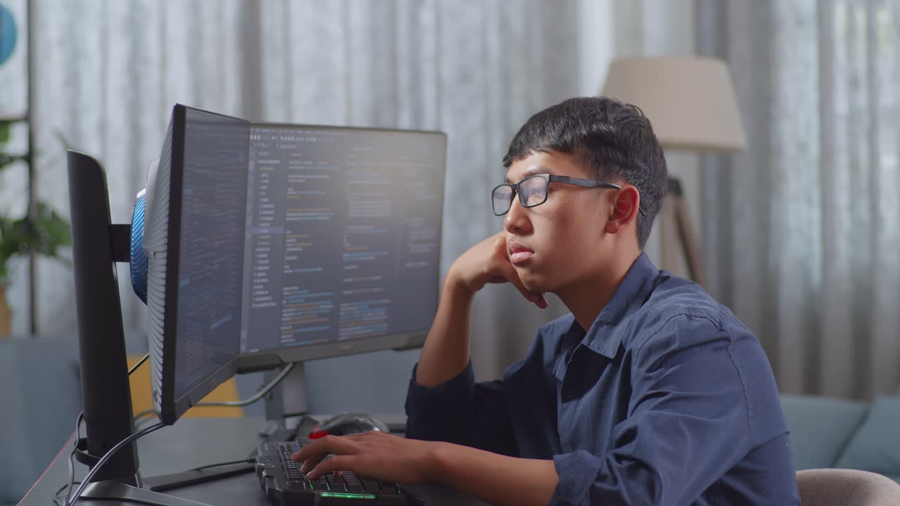 Young Programmer Focused on Coding