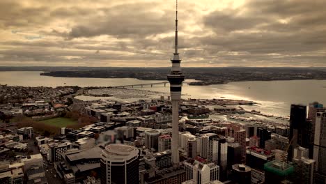 drone shot of famous high rise sky tower, auckland city, new zealand