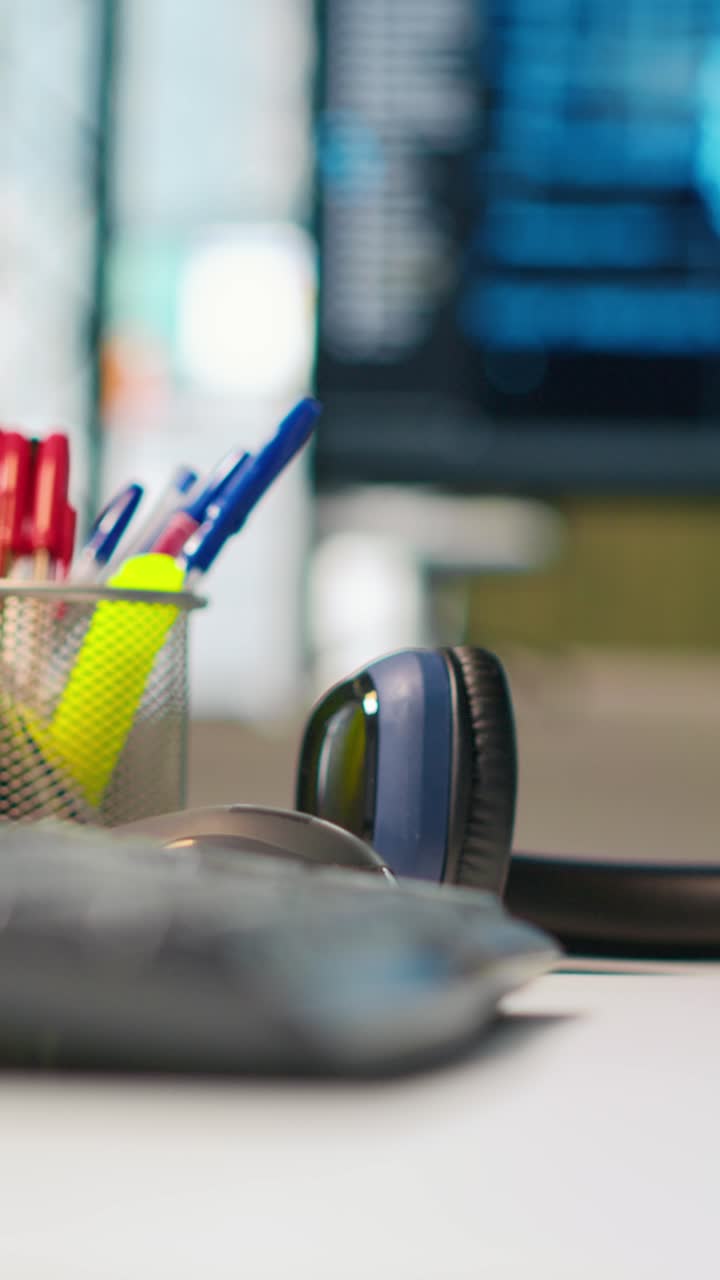 Vertical video PC monitor on startup office desk shows artificial intelligence neural networks