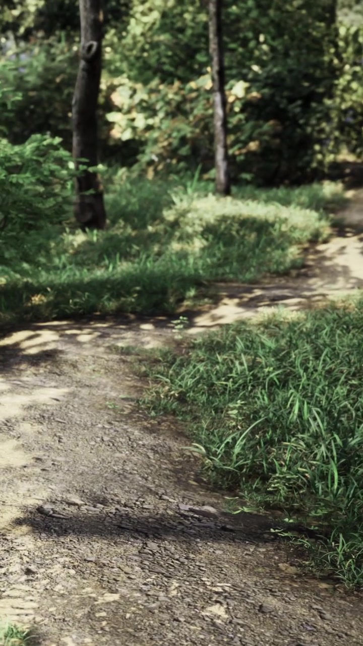 Park path with benches surrounded by grass and trees during daytime