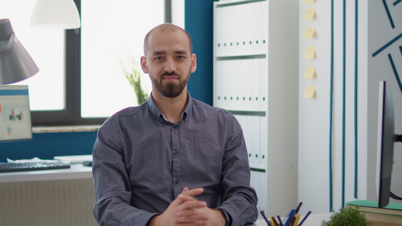 Portrait of business man working with computer on growth strategy