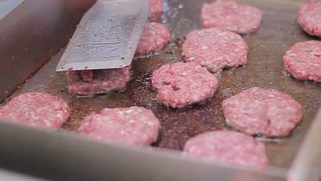 preparation of raw hamburger in the backyard of the house, slow motion