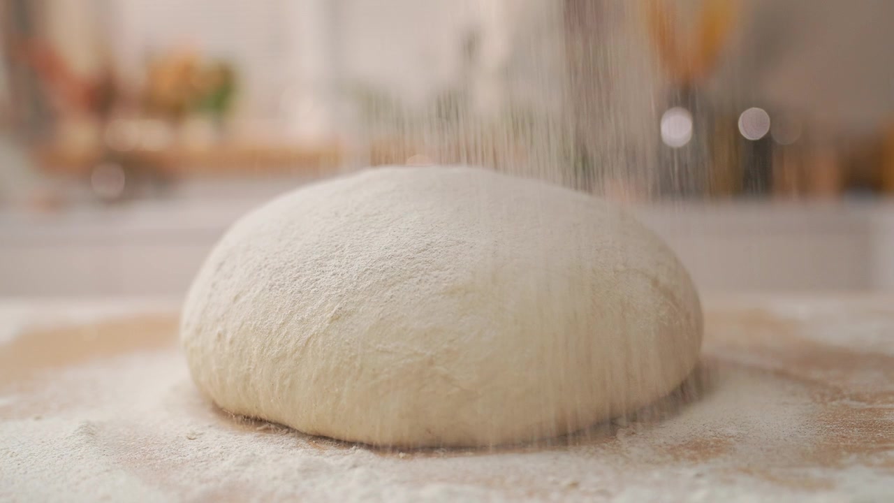 Close-up of Flour Dusting Fresh Bread Dough