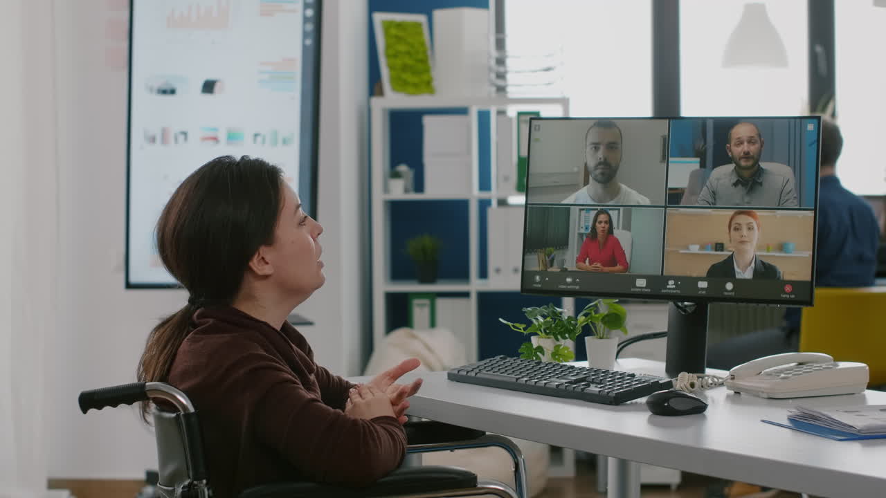 Immobilized manager woman speaking online with remotely coworker