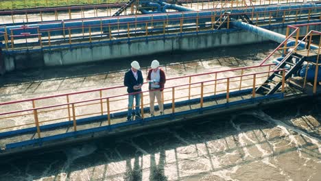 male businessmen discussing a cleaning facility