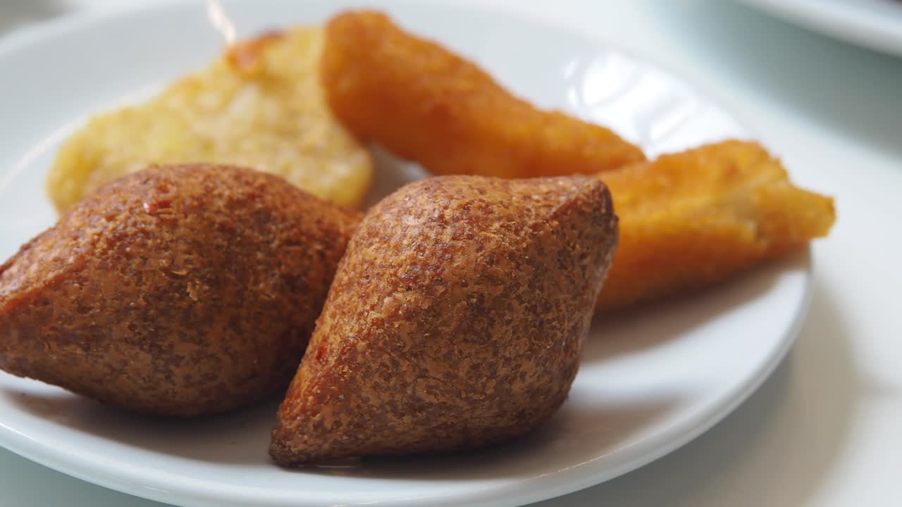 Plate of kibbeh and fried food
