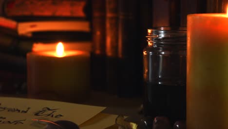 close up background of an ancient library, next to a frieplace, with old books, a feather, old paper, ink, stones, and candles with flickering flames, with some dust flying around