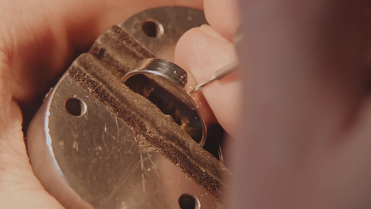 Close-up of a goldsmith working on a ring