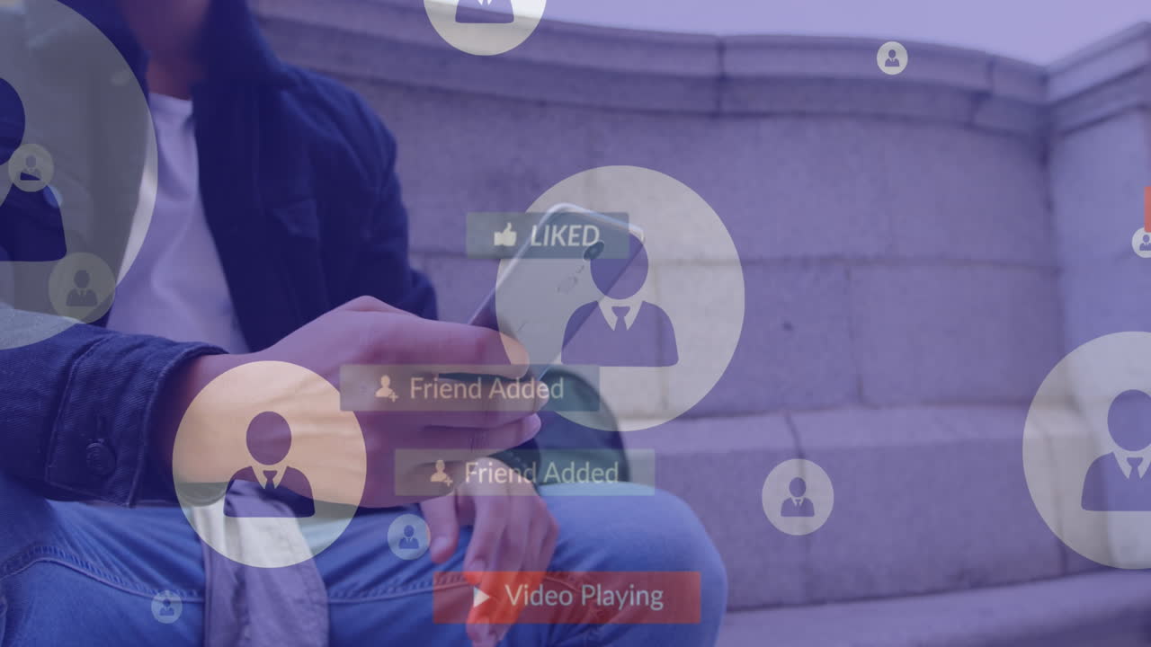 animación de iconos de los medios sobre un hombre biracial usando un teléfono inteligente