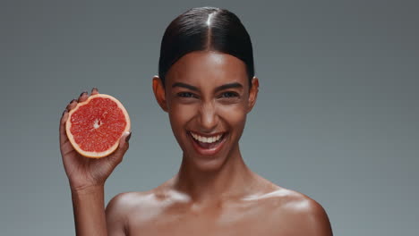 mujer, rostro y belleza con pomelo