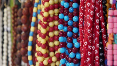 colorful beads and jewelry for sale in a turkish market