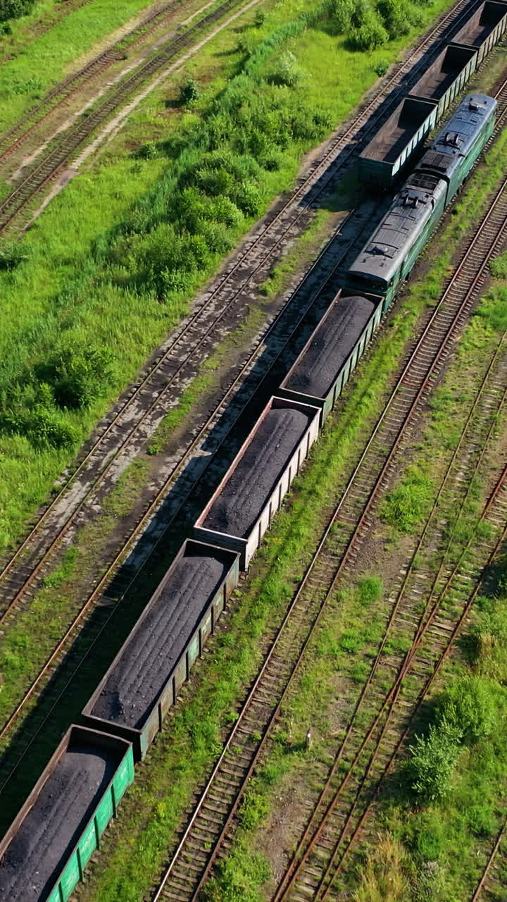Freight train on the railway. Aerial drone view of freight train