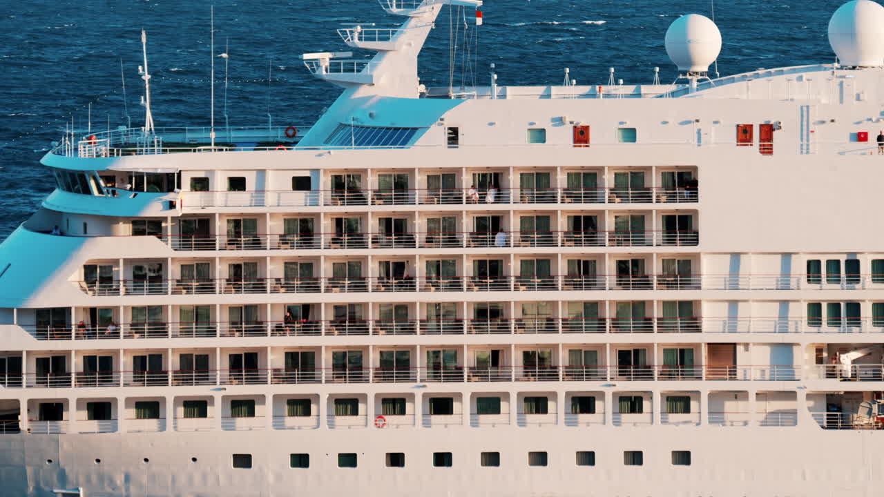 Large cruise ship docked in the Monaco Marina in the evening
