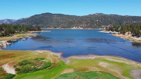 Aerial-view-of-drought-at-big-bear-lake-in-southern-California's-mountain-lake-escape-within-the-San-Bernardino-National-Forest