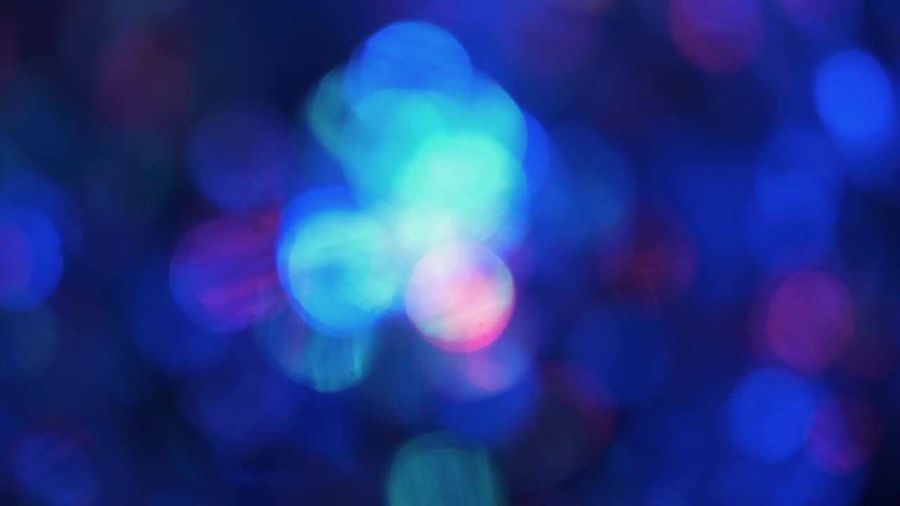 Panorama. Colored shining bokeh lights, sparkling glitter lights. New year, luxury background.