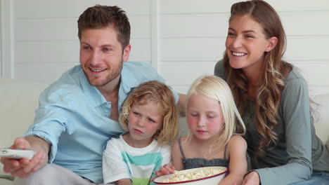 family watching television together