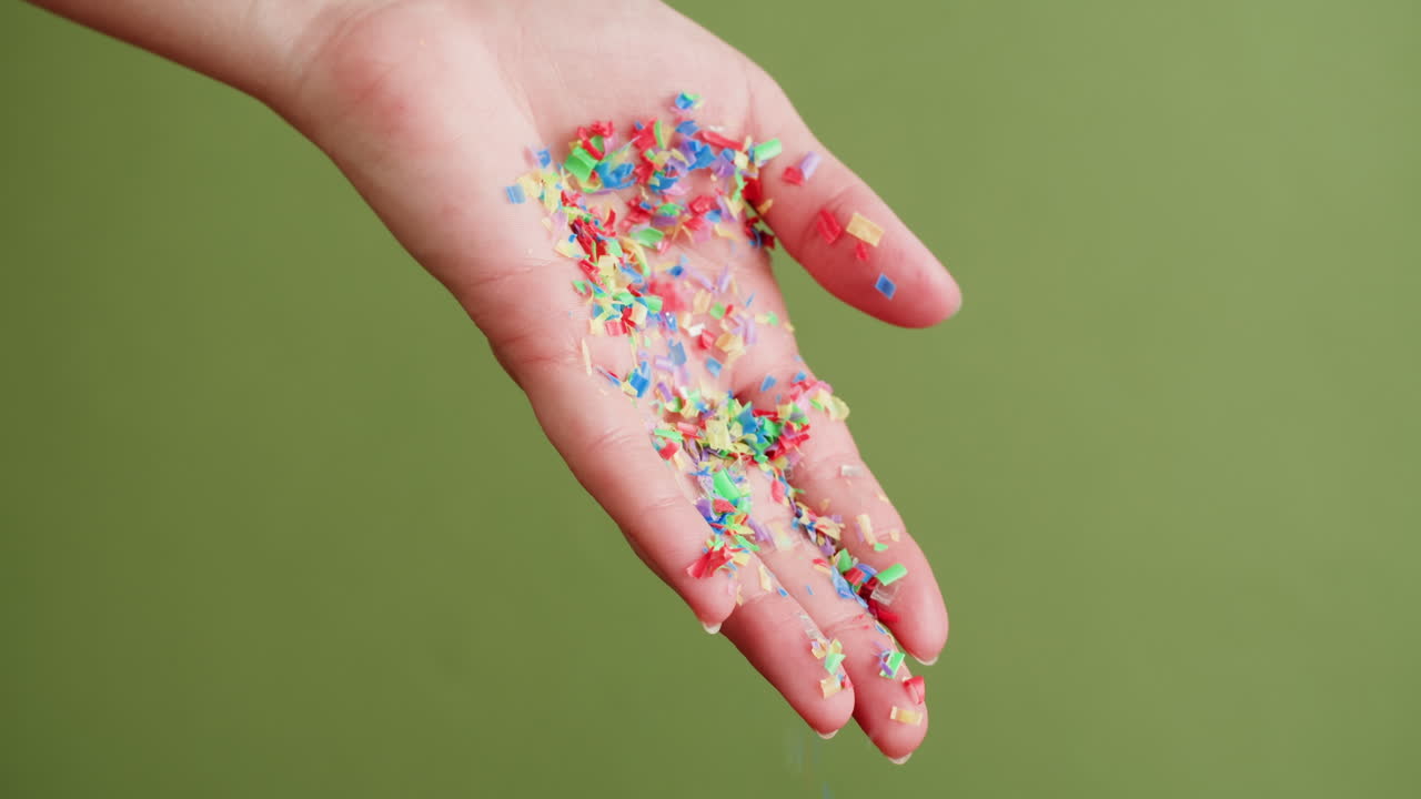 Recycled Plastic Pieces in Hand