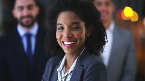 a-young-businesswoman-standing-in-an-office