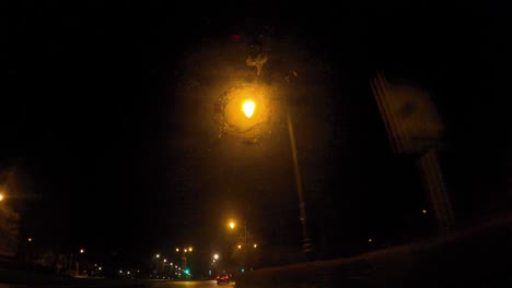 POV-Of-Brussels-Road-Tunnel-With-Passing-Cars-On-A-Rainy-Night