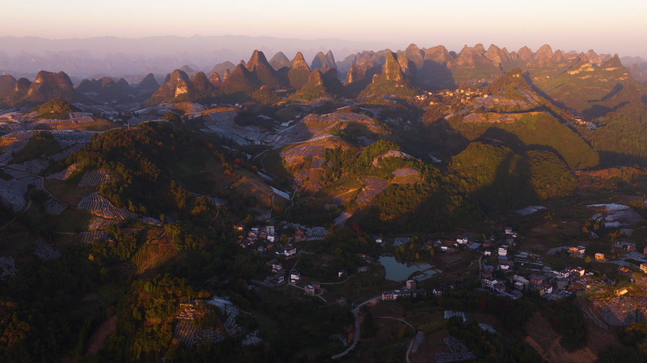 Scenic Landscape Of Karst Mountain At Sunrise In Yangshuo County, China - Aerial Drone Shot