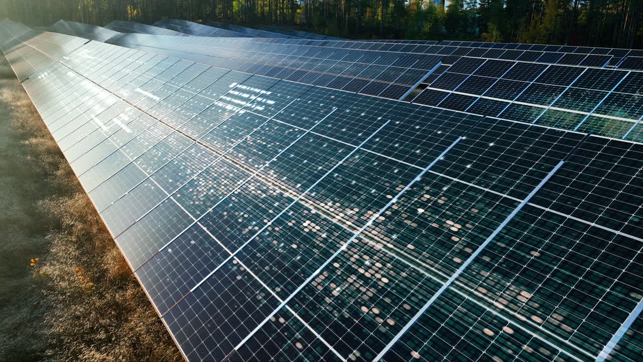 Solar panels absorbing sun energy at a sunlight power field - CGI render Aerial