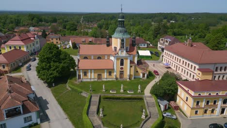 beautiful aerial top view flight church on hill at village chlum in czech republic europe, summer day of 2023