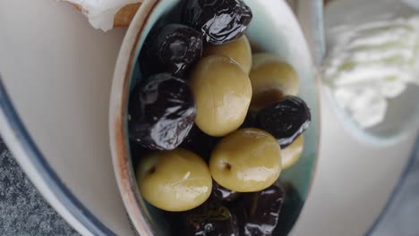 breakfast platter with olives and cheese