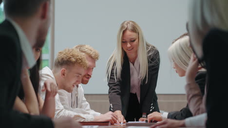 business-meeting-of-specialists-and-top-managers-on-company-women-and-men-are-discussing-strategy