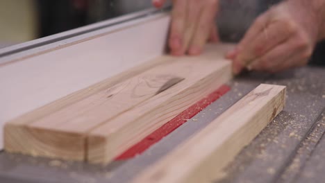 circle saw cutting wooden block