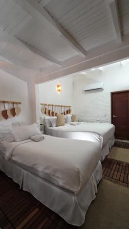 a beautifully designed family bedroom featuring spacious interiors, elegant decor, and cozy hammocks for relaxation. the room combines comfort with style, perfect for a peaceful retreat.