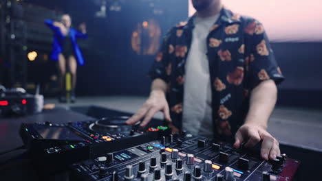 dj mixing music at a nightclub