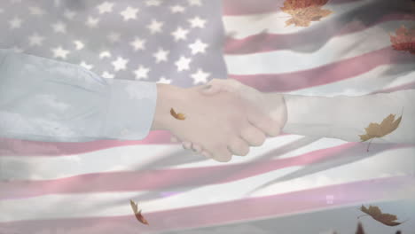 animation of shaking hands and leaves over flag of usa