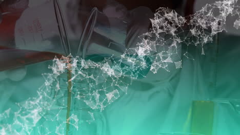 animation of network of connections spinning over mid section of scientist working at laboratory