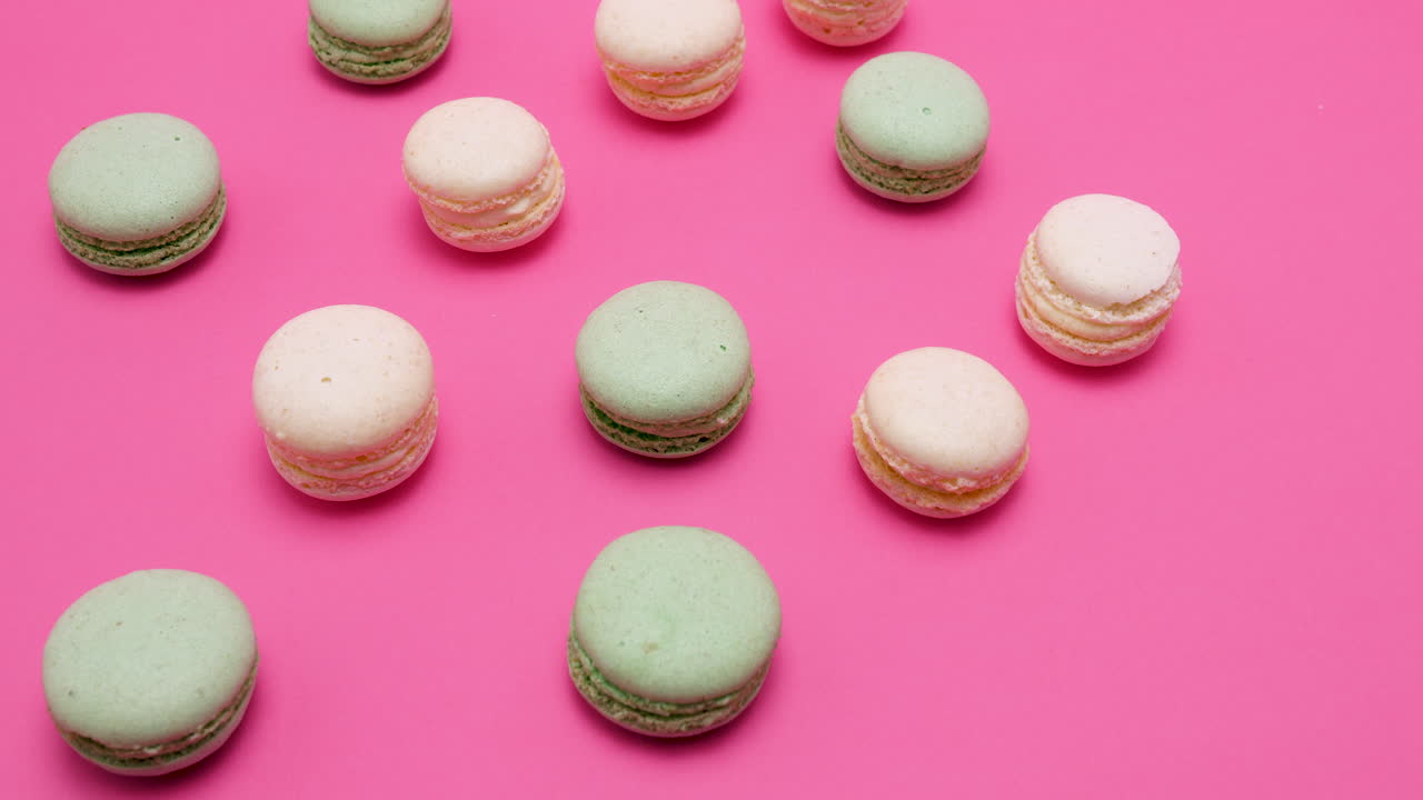 Macarons on a pink background