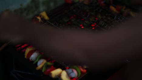 Handheld-shot-of-preparing-veggie-barbecue