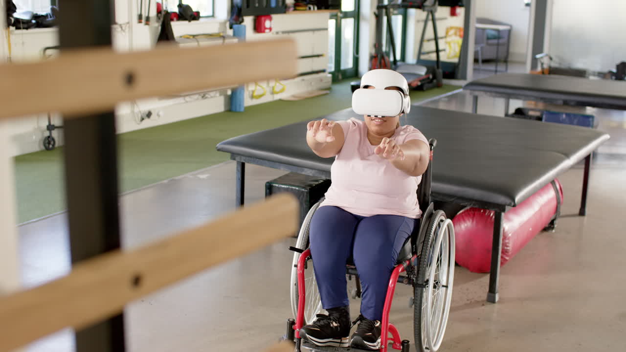 Using vr headset, woman with paraplegia in wheelchair exercising, rehabilitation center, copy space