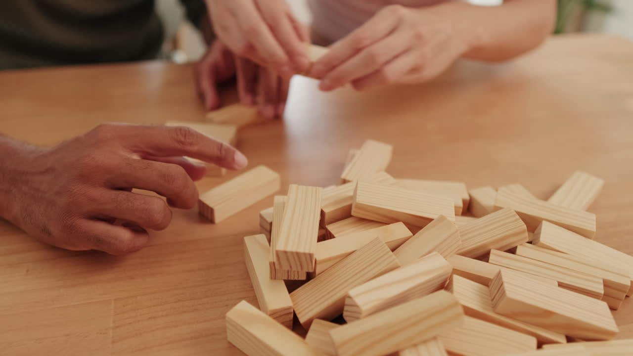 Couple Playing Jenga at Home
