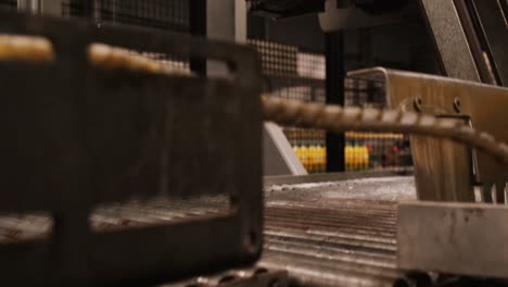 Machine-separating-juice-bottles