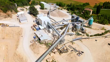 Production-Of-Construction-Materials-At-Open-Pit-Limestone-Mine---aerial-drone-shot