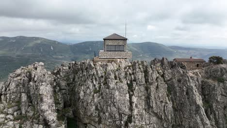 stunning lost guard house on the top of a rocky hill