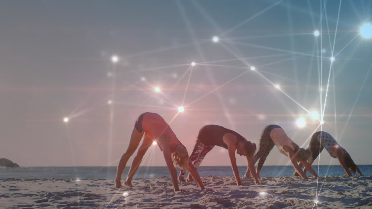 Sahilde yoga ve meditasyon yapan kadın arkadaş grubu üzerinde veri işleme animasyonu.