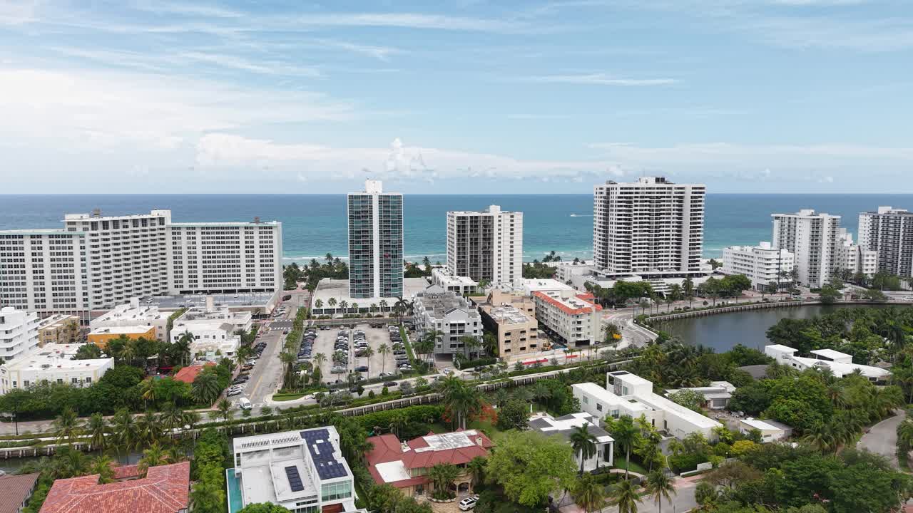 Establishing Drone Shot of Miami Beach Florida USA, Beachfront Towers and Houses Around Indian Creek